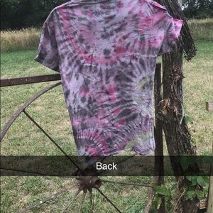 Hand tied and dyed. Crew neck tie dyed shirt. Size small